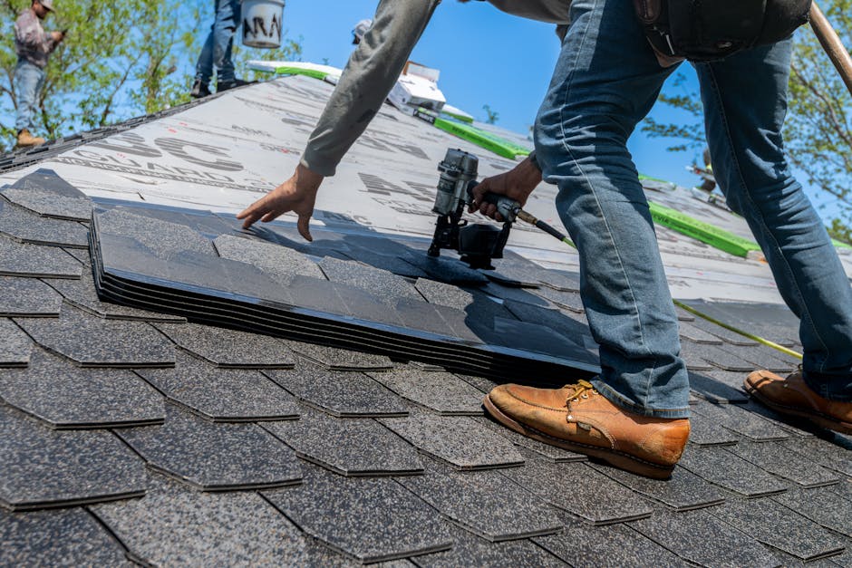 GAF Master Elite contractor installing Timberline HDZ shingles on residential roof